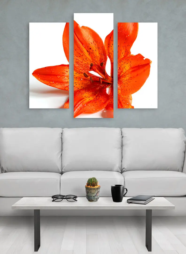 Flower on wall art canvas in three parts. Sofa, lamp, plant and table in room interior.